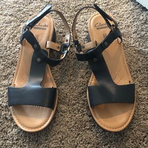 Clark’s black leather sandals